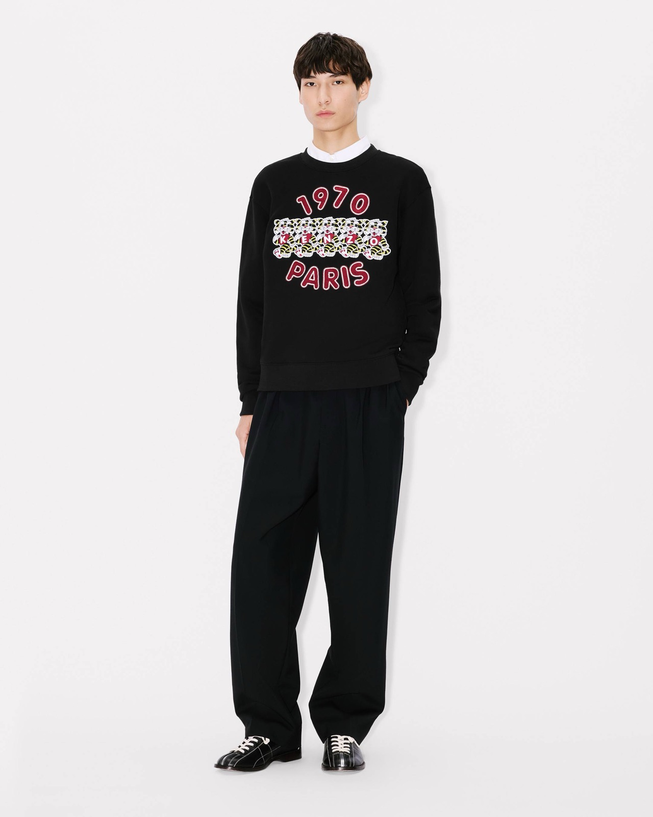 Full-length styling with tailored trousers