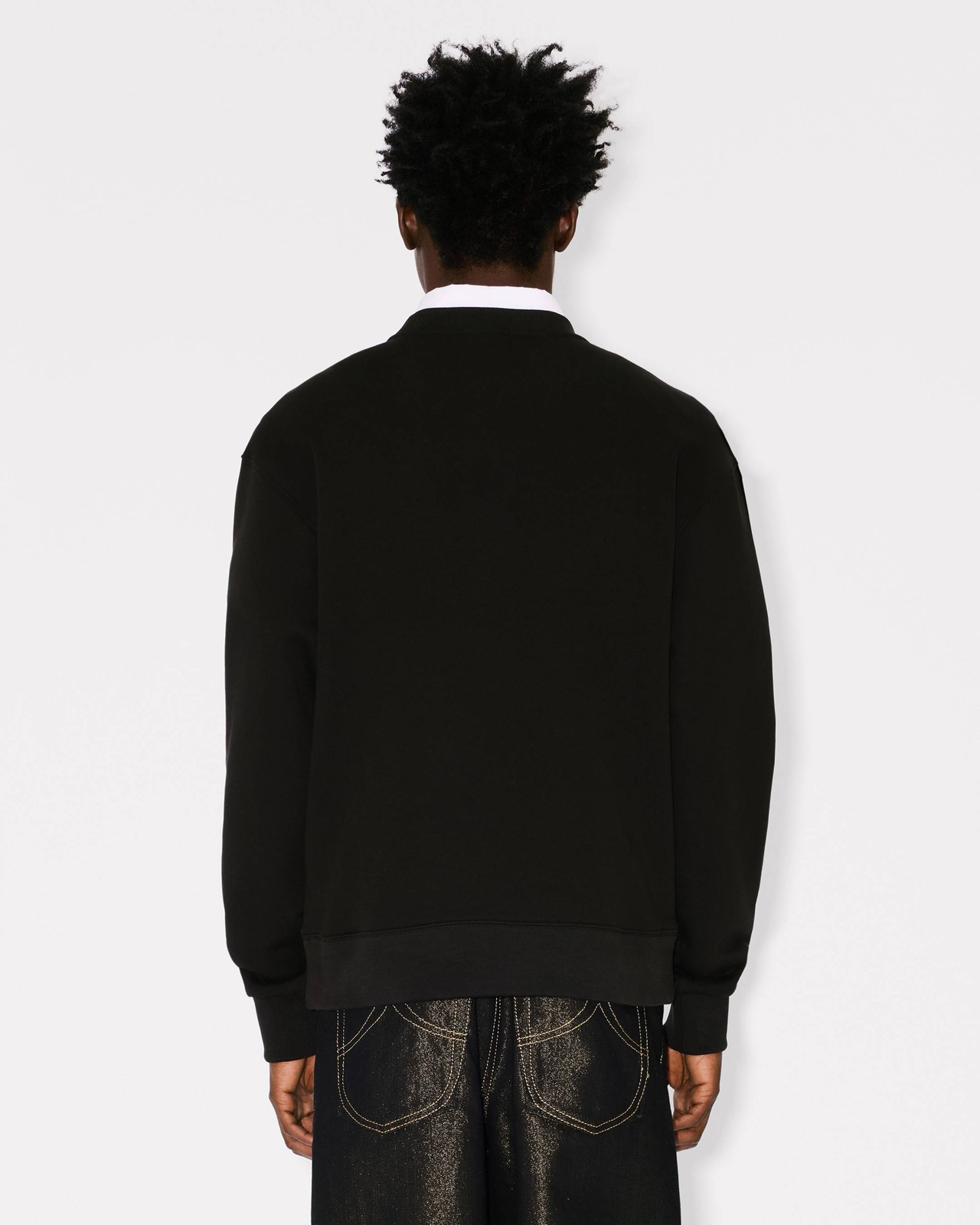 Clean back view of the crew-neck cotton body