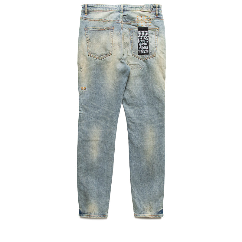 Rear close-up of the pocket tag and aged denim texture
