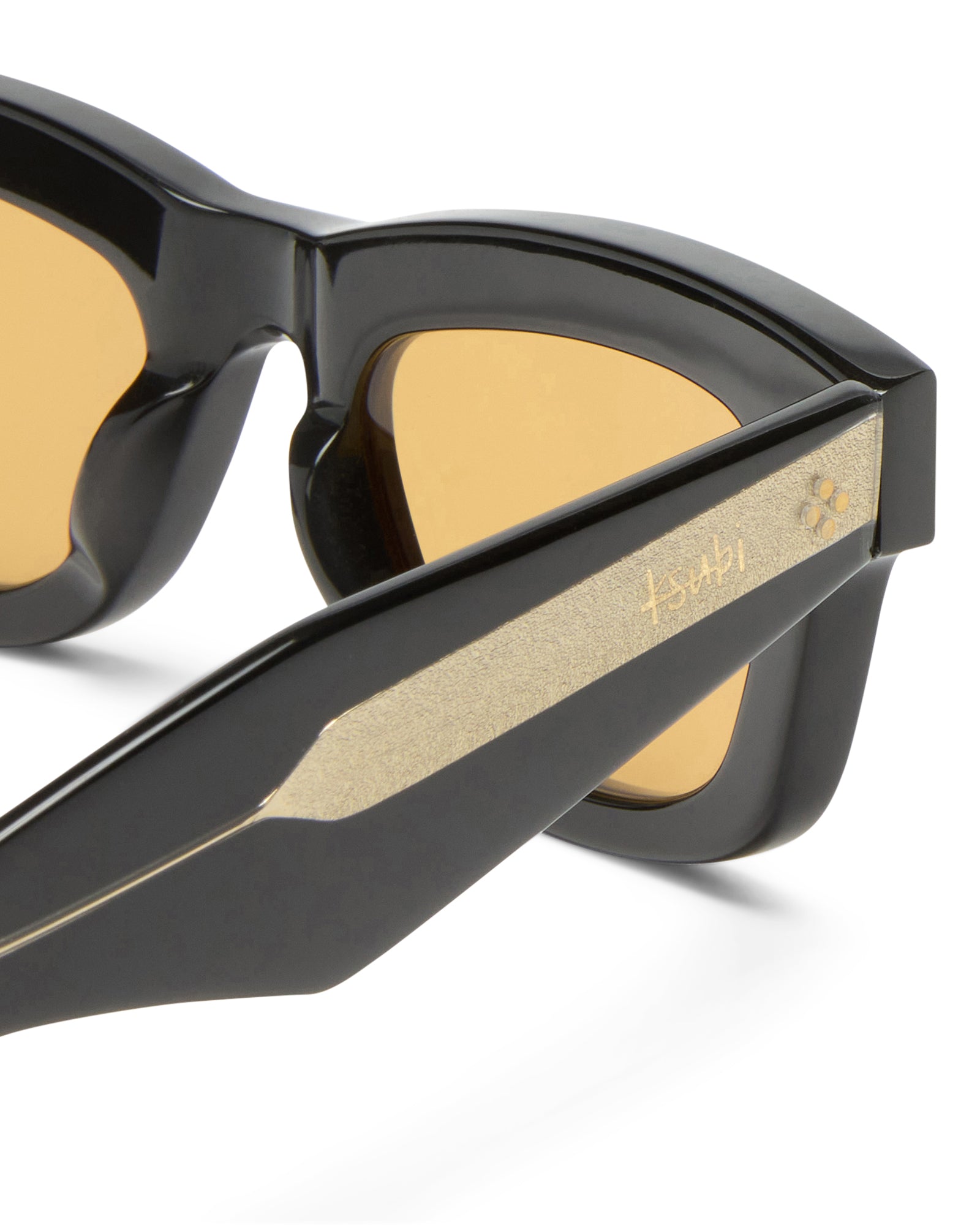 Detail angle highlighting the gold-toned side branding