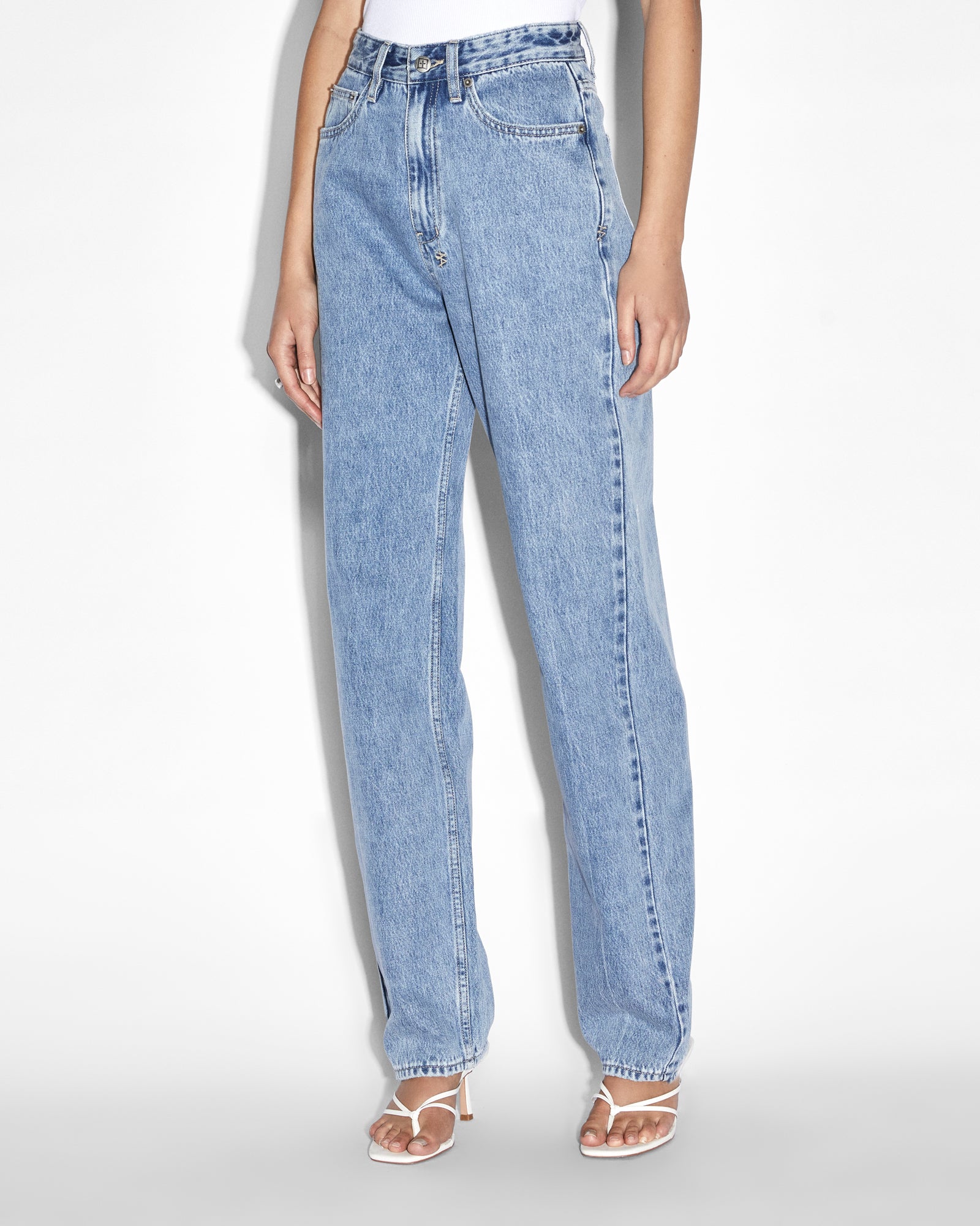 Styled front view with the jean sitting cleanly at the waist