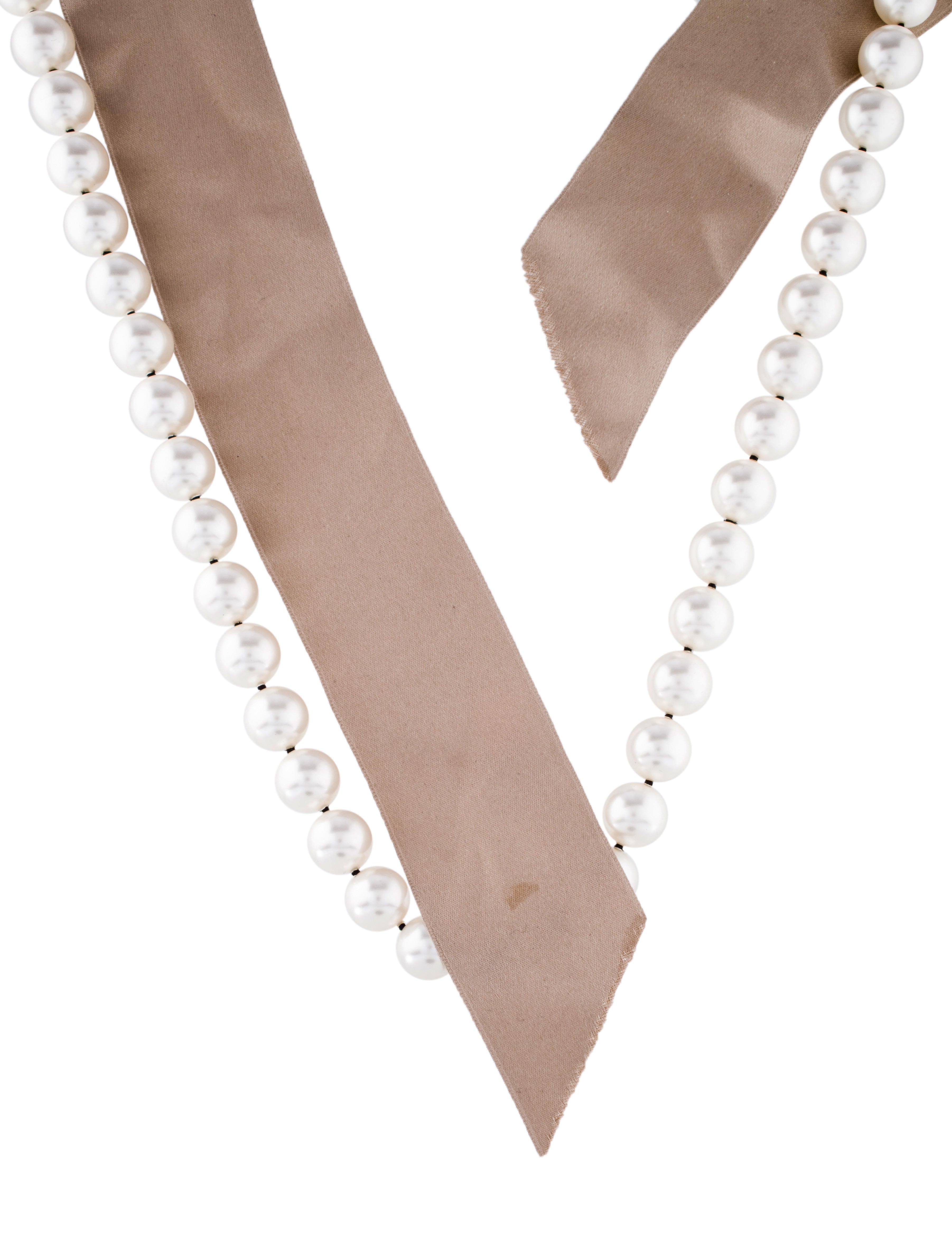 Pearl-and-ribbon detail showing the gathered strand