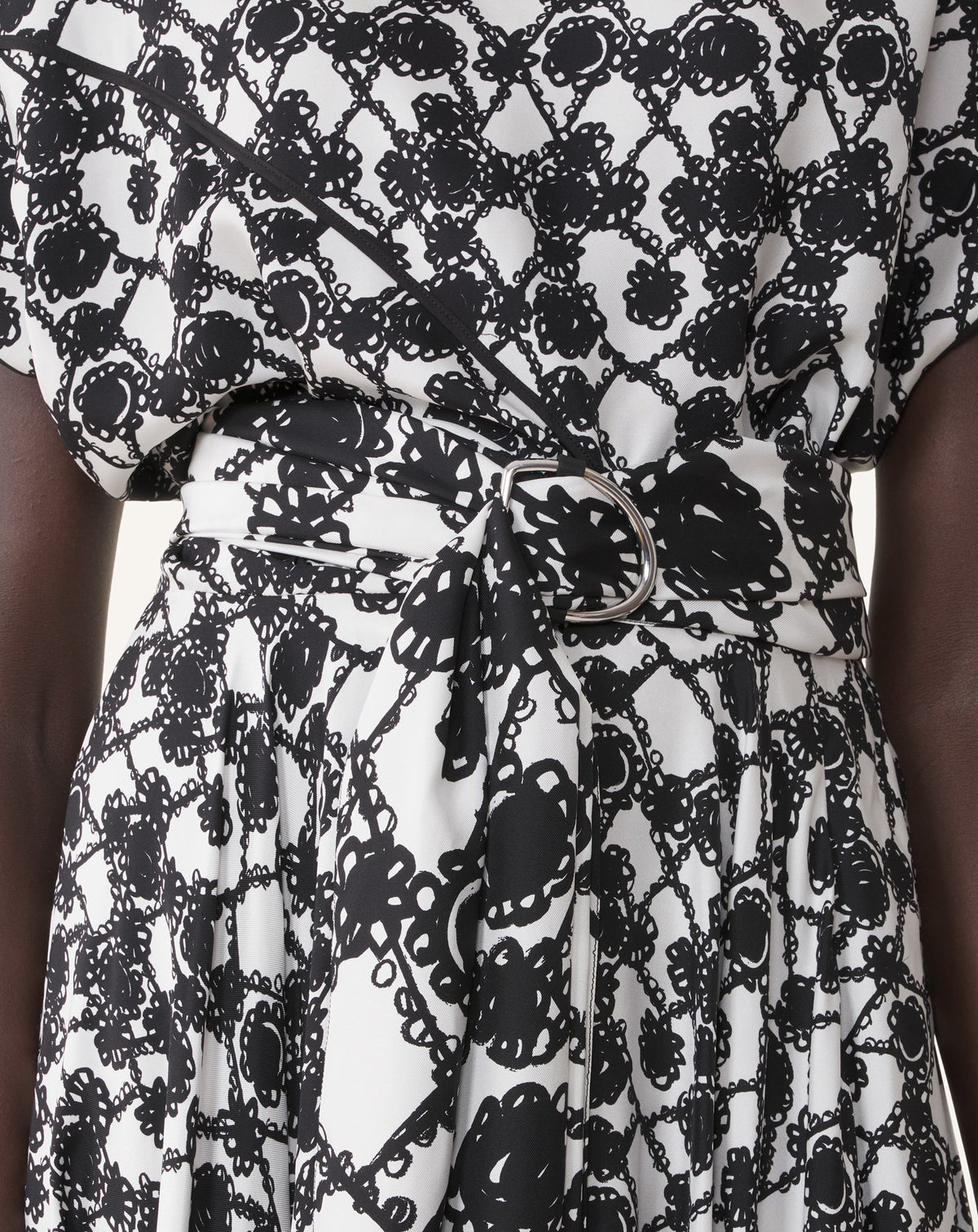 Detail of the printed silk and the tie waist