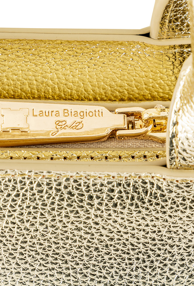Back view of Monogram gold BAG