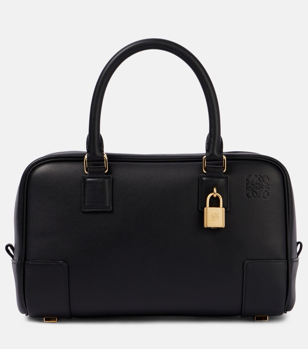 Amazona 23 in tan — showing the dual top-handle arc
