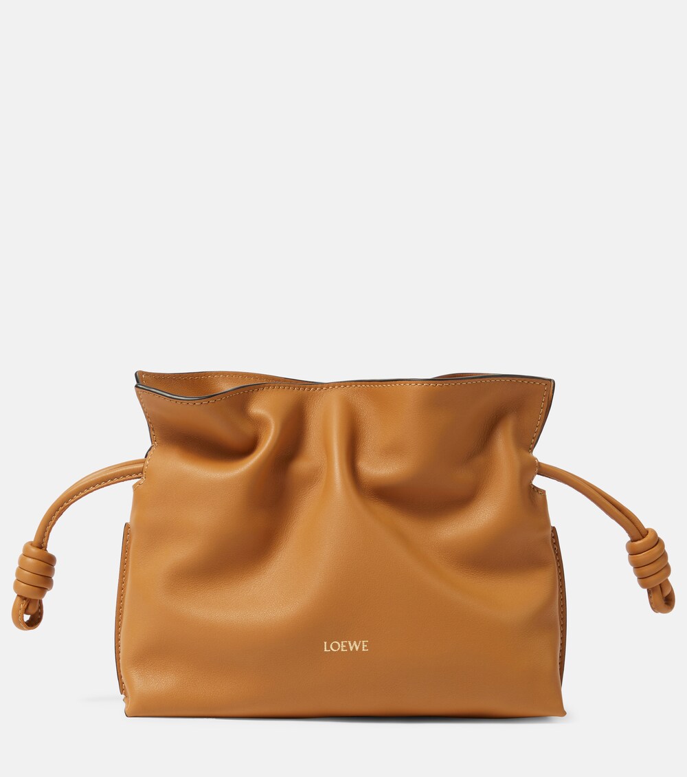 Flamenco Mini in smooth tan leather — clutch proportion