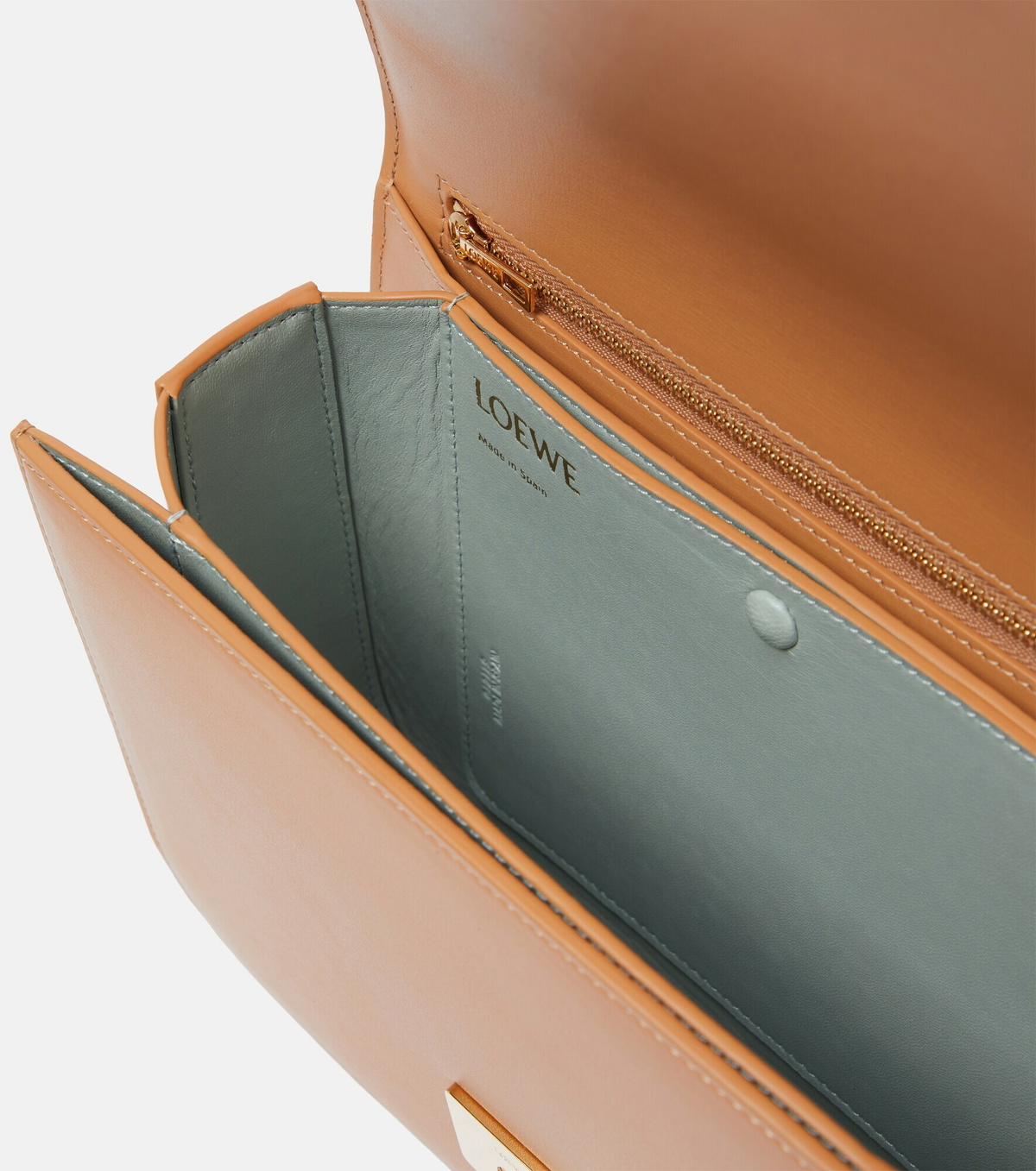 Interior view — the suede lining and flat internal pocket