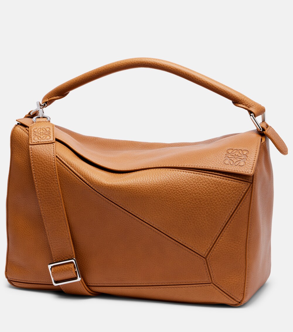Large in soft grained calfskin with shoulder strap