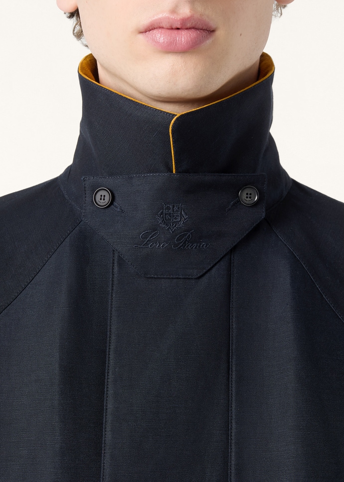 Detail of the stand collar, gold piping and Loro Piana crest