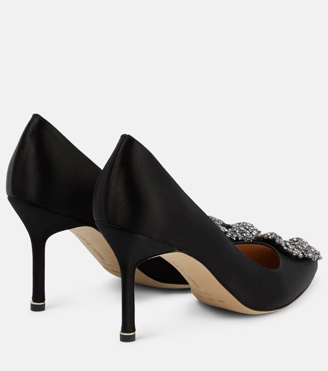Side profile that shows the sculpted high heel