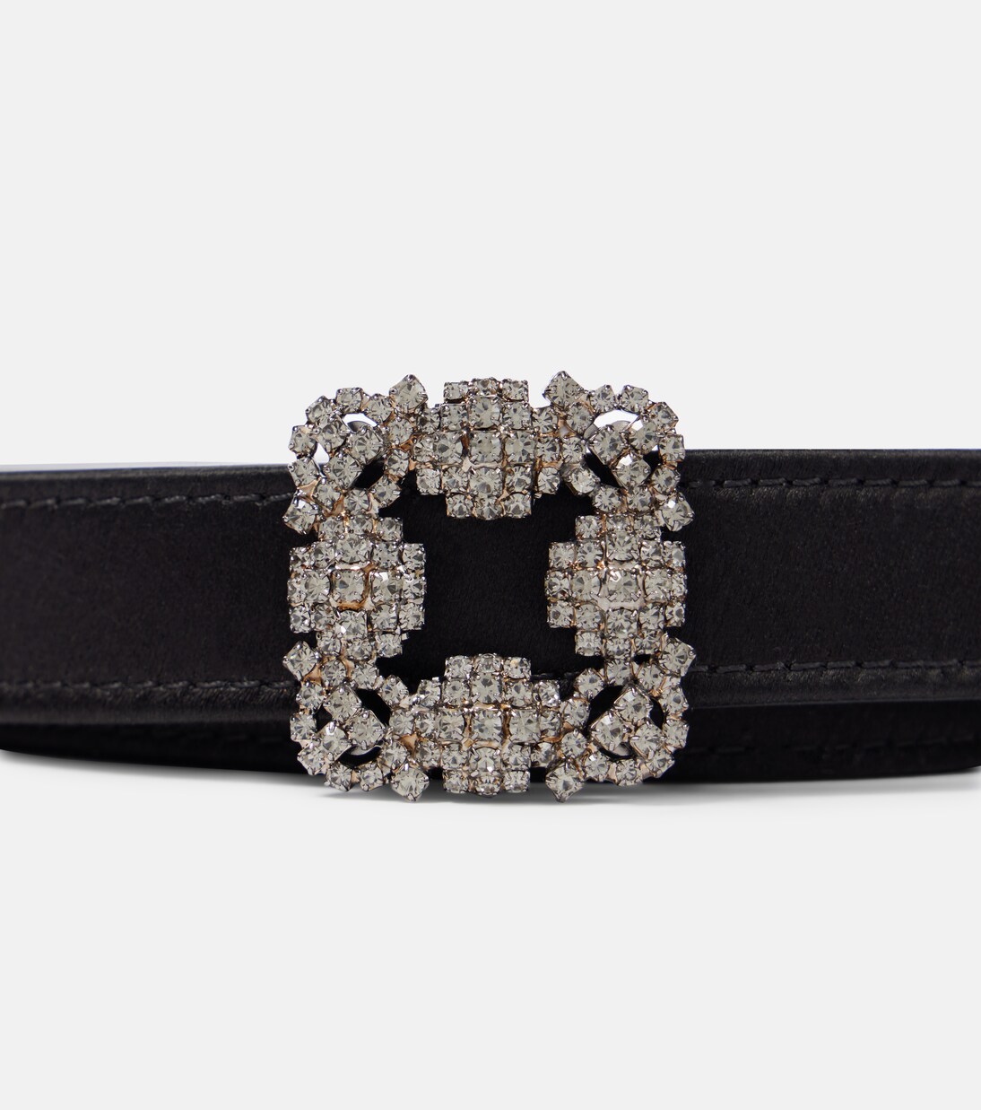 Black buckle close-up on the belt strap