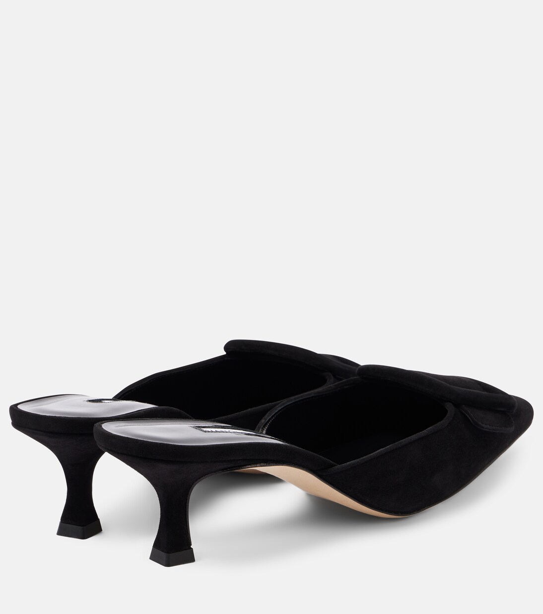 Rear angle showing the low heel and open back