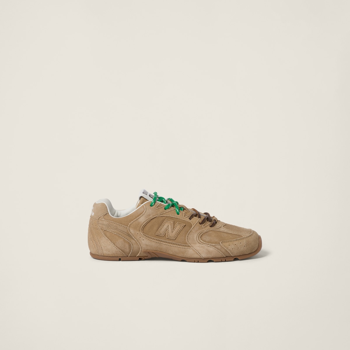Side profile — the ultrathin sole and contrasting brown-and-cream lacing