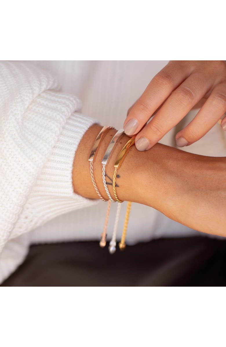 engraved bracelet on wrist