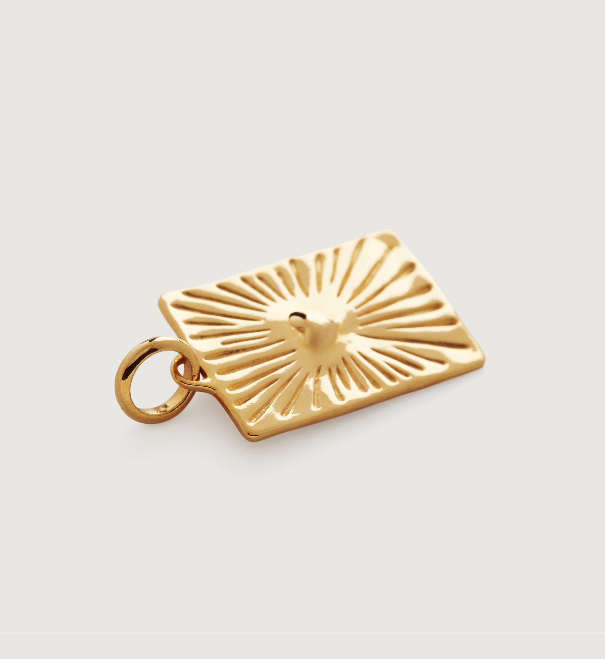 gold heart pendant close-up