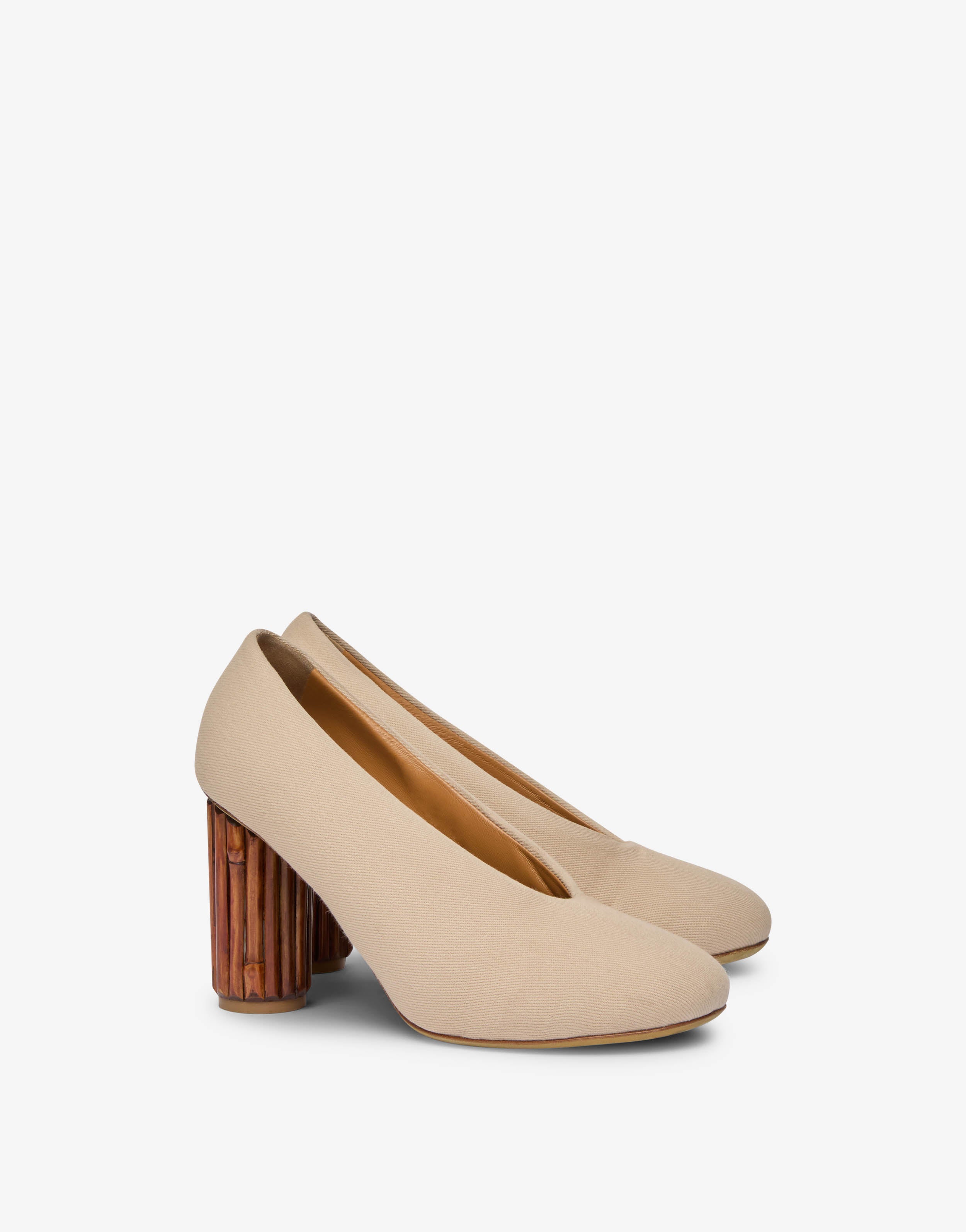 Canvas pumps with sculpted heel