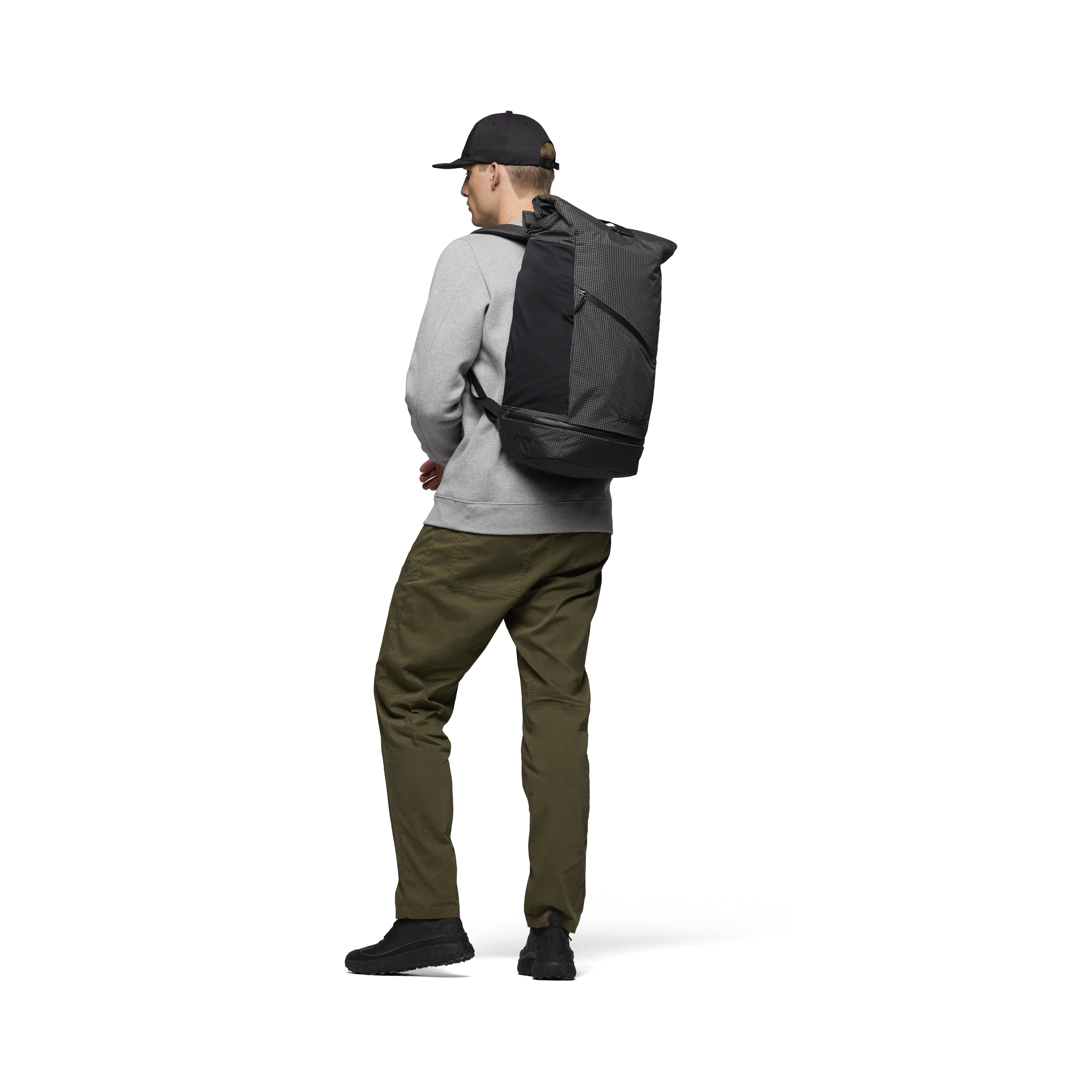 Female Look opening image of norrona commuter ACE 35L Pack Caviar Black