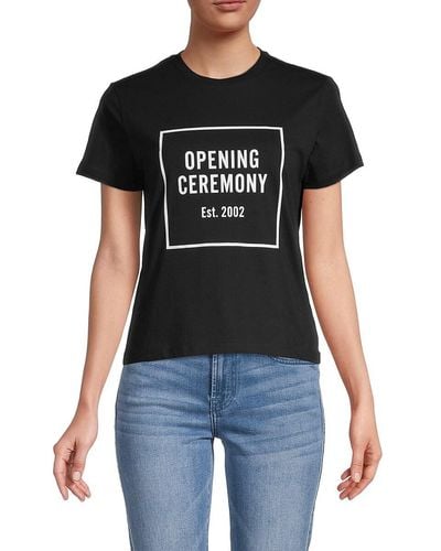 White box-logo tee with the print held deliberately flat and graphic