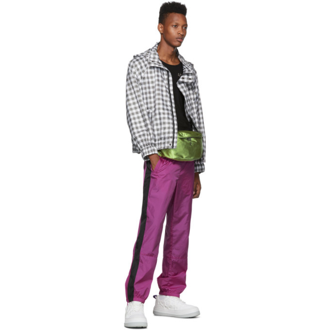 Side profile showing the bag on-body as a waist pack