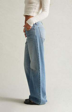 Back view — the roomy seat and full-length leg keep the fit loose.