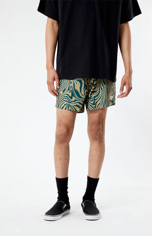 Worn fit — the short inseam keeps the look compact and easy.