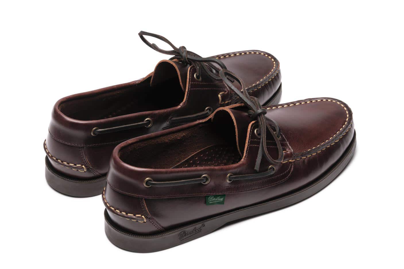 Pair view with the boat shoes angled inward.