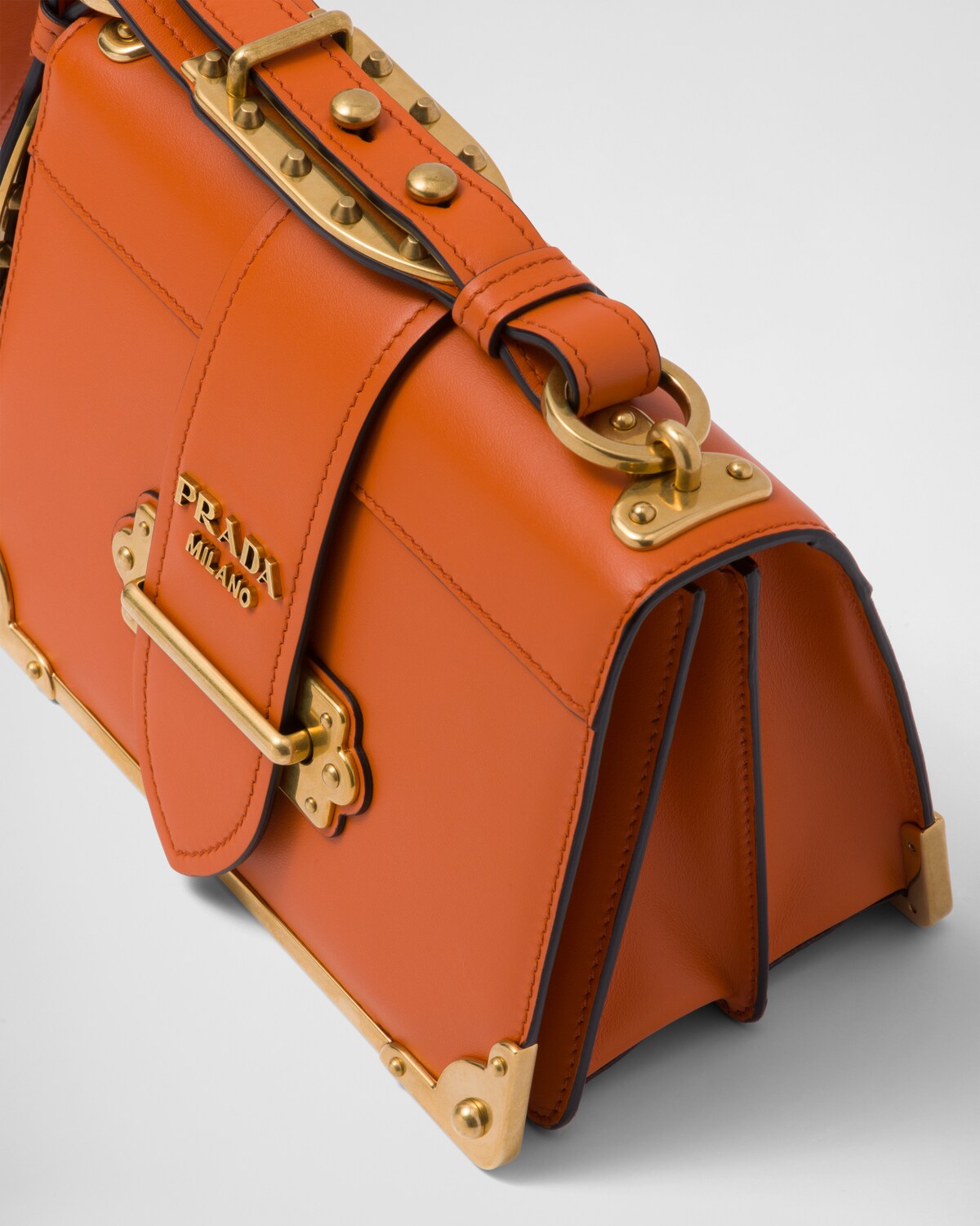 Papaya Cahier, three-quarter detail — colour-blocked book-binding panels