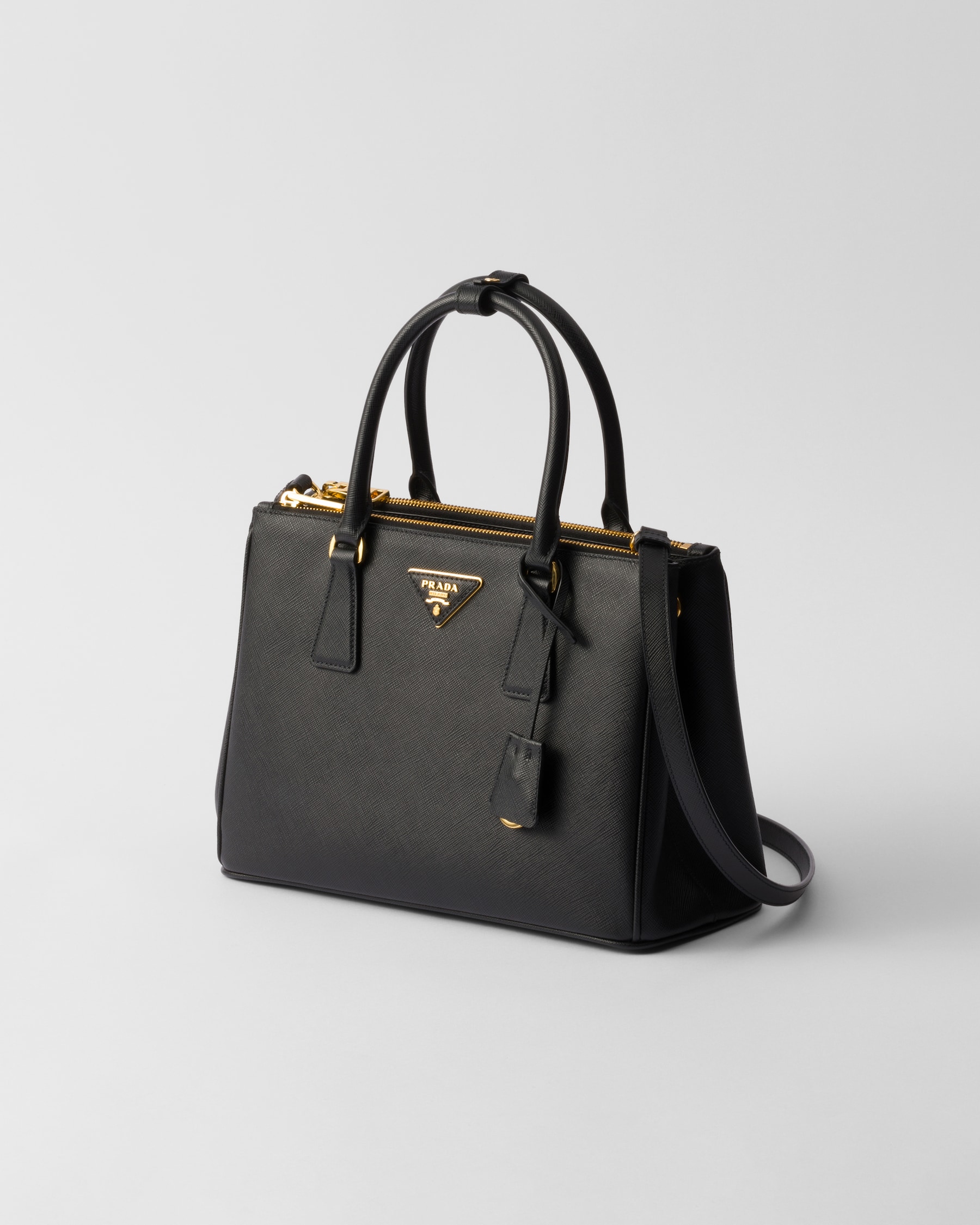 Three-quarter view with the removable shoulder strap attached