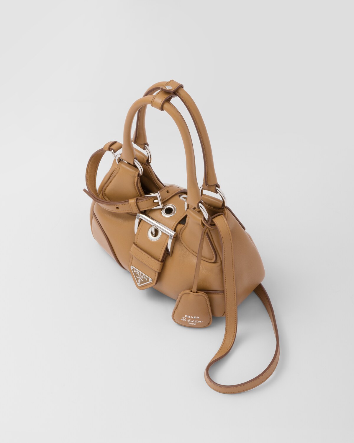 Caramel Moon, three-quarter view — the soft padded panels and buckle