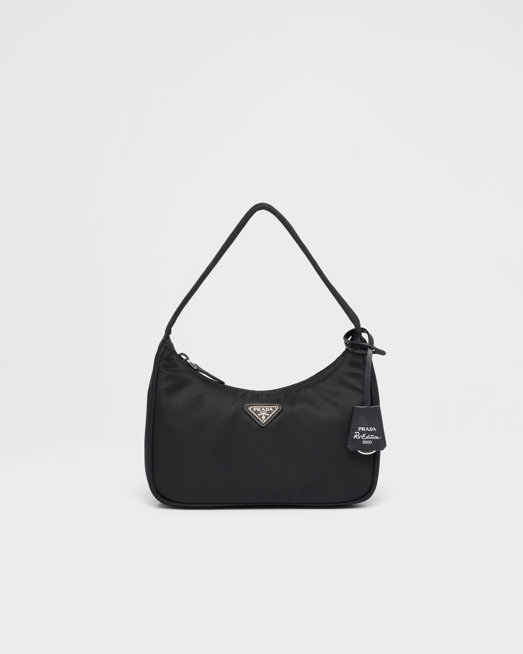 Black Re-Nylon front packshot with the Re Edition 2000 keychain