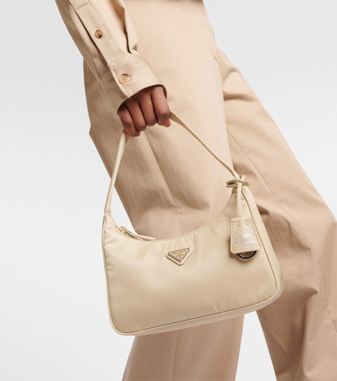 Worn under the arm on the short single strap — the Y2K posture