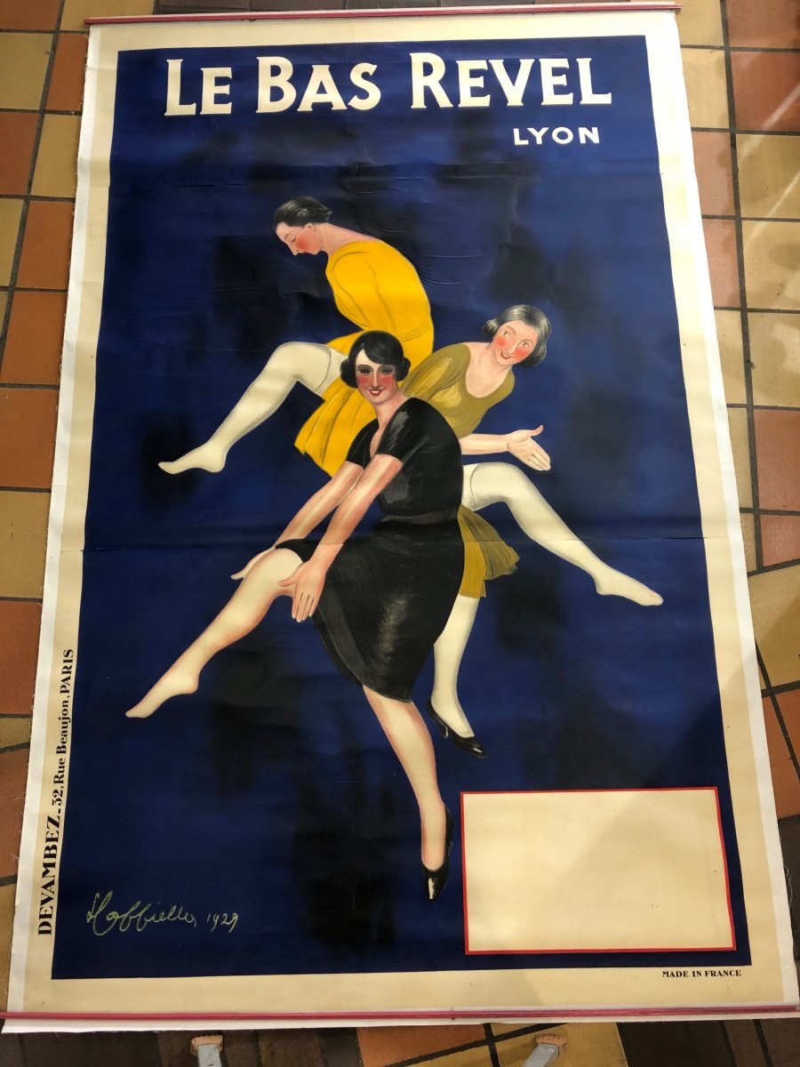 Another dealer view showing the full poster laid against tiled floor