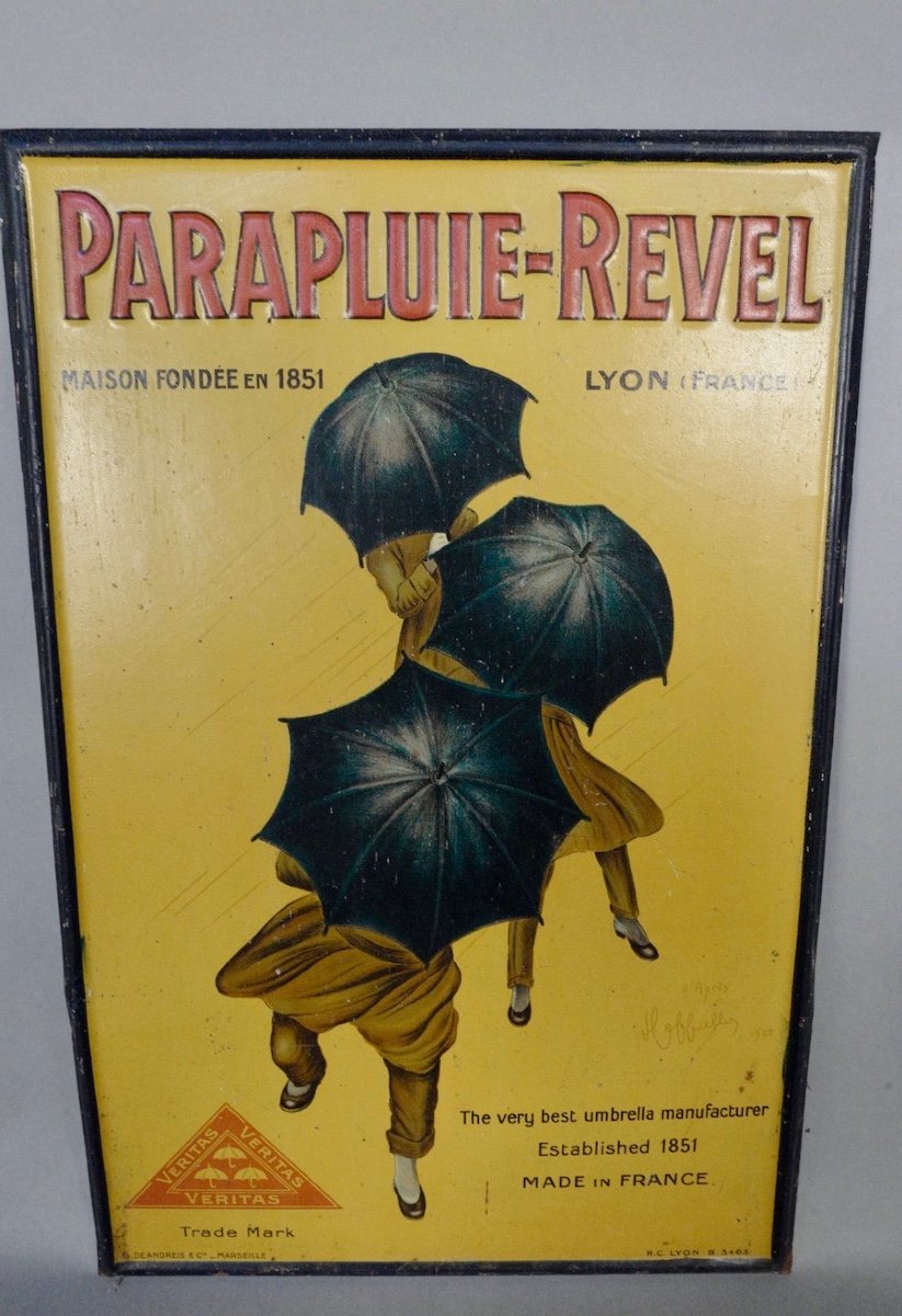 Close framing that keeps the oversized title and umbrellas central