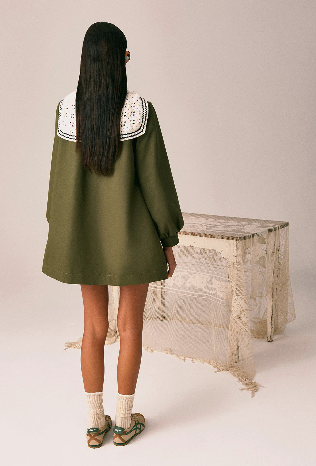 Sailor collar worn over outerwear