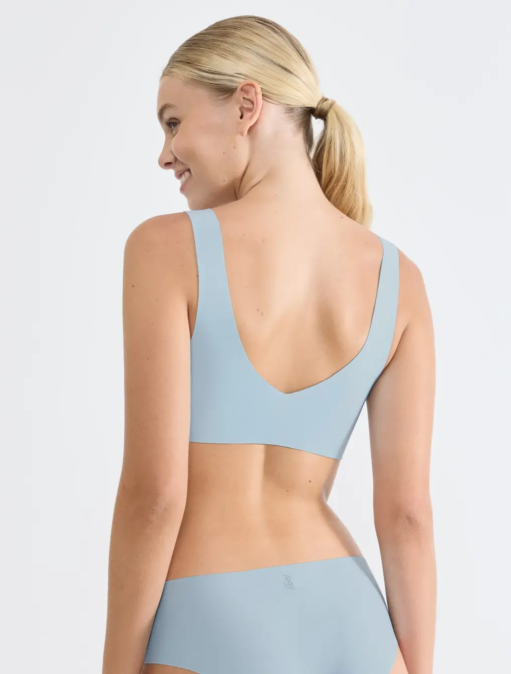 Clean front fit with soft V neckline