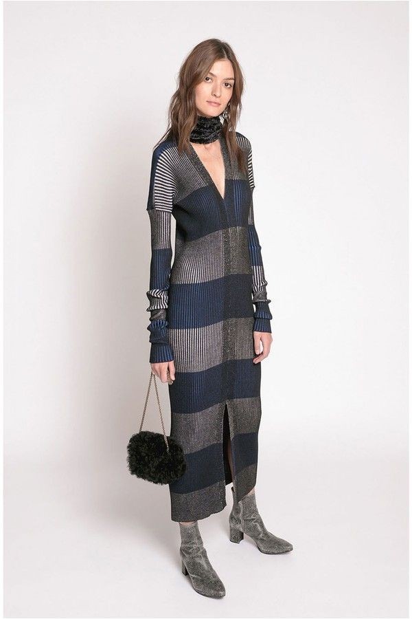 Long striped knit dress styled with dark layers