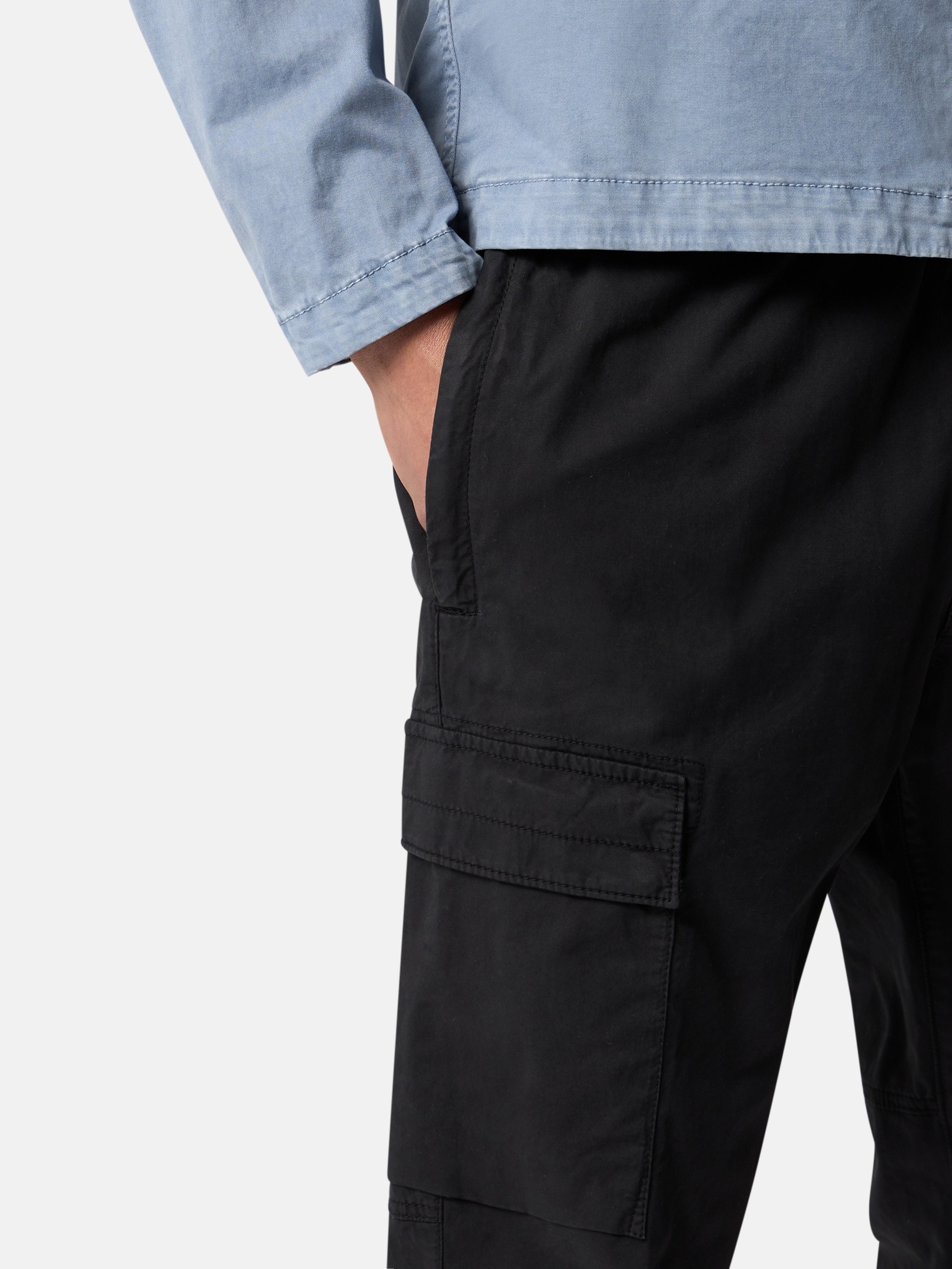 Detail — the waistband and hand pockets