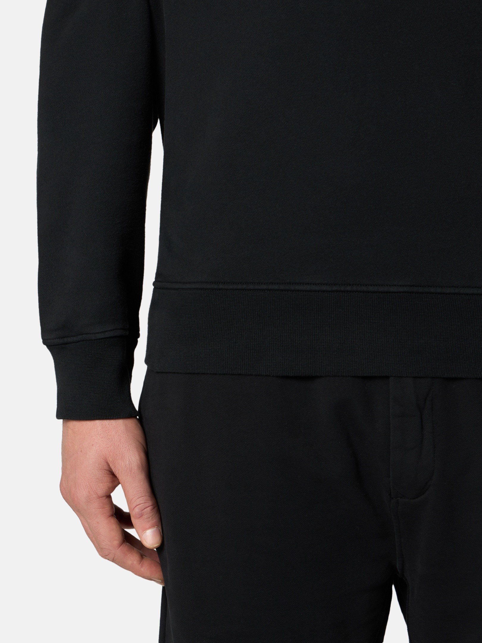 Detail — the garment-dyed cotton surface