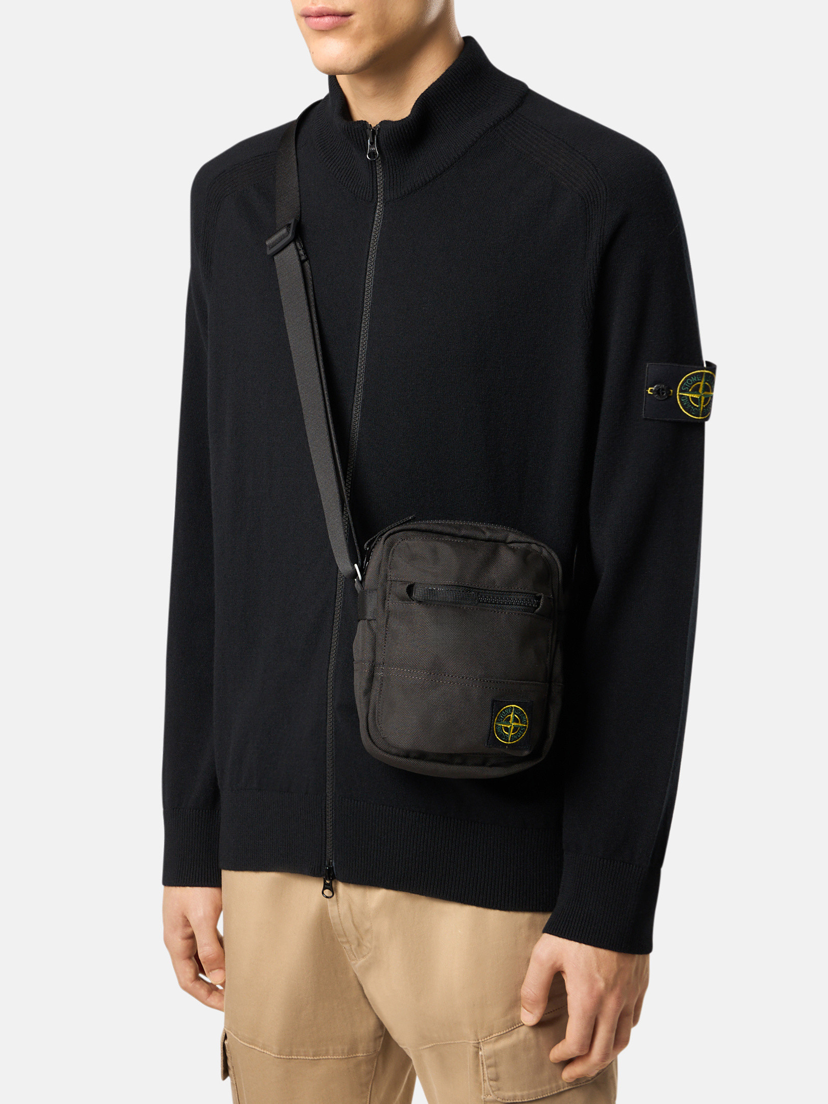 Back view — the zip compartments and webbing strap