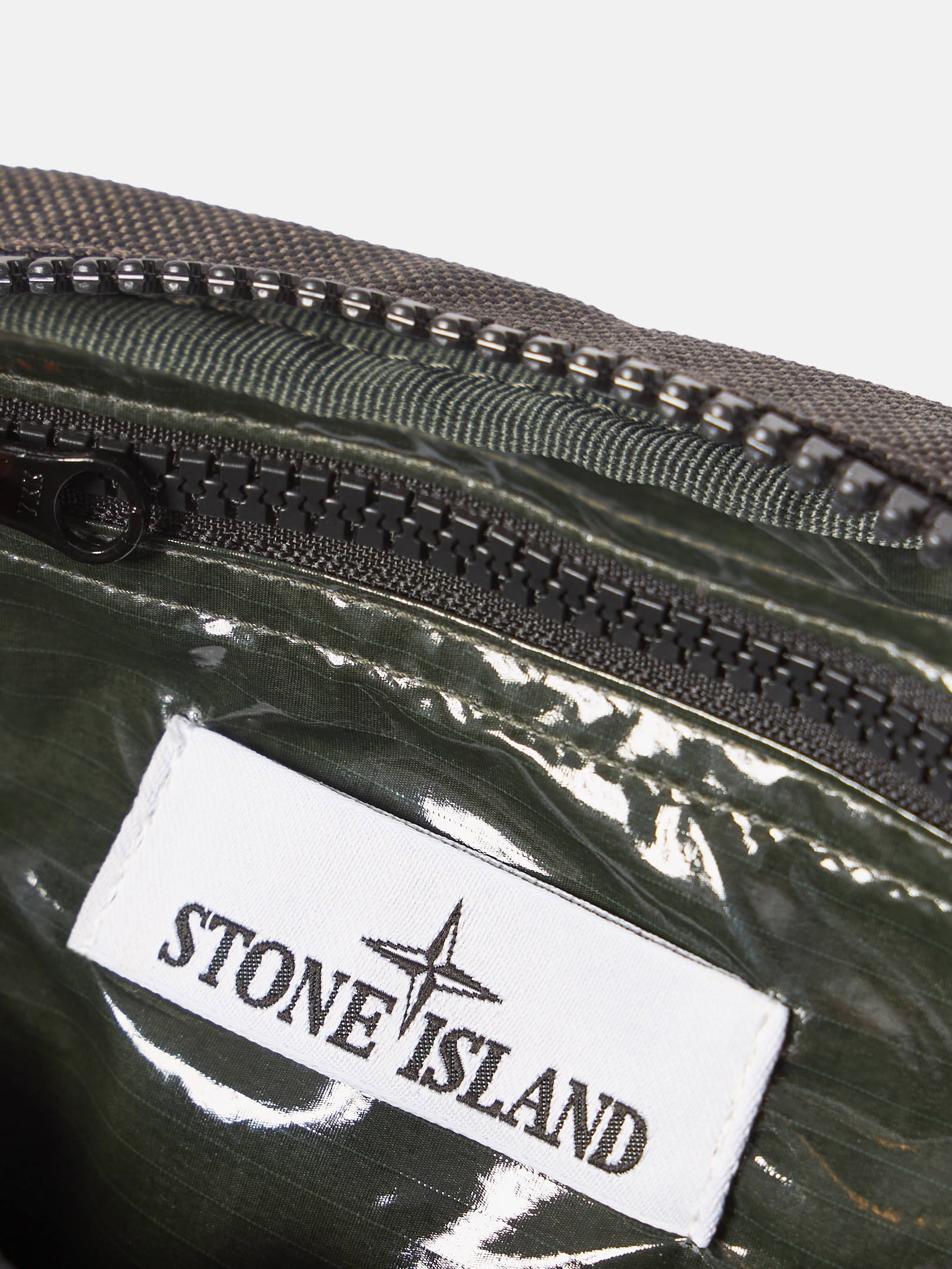 Detail — the zip pulls and fabric texture