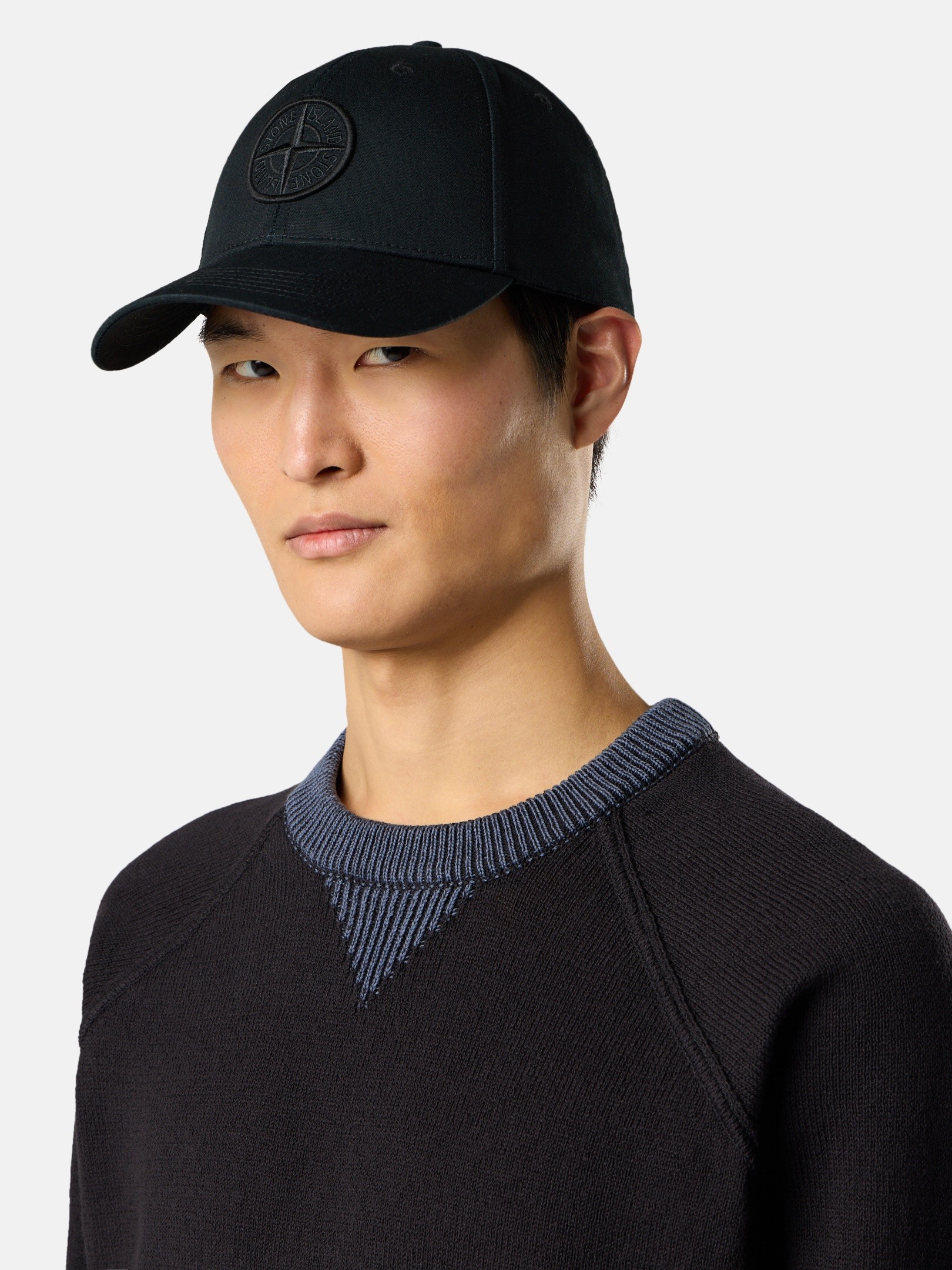 Three-quarter — the curved brim and crown