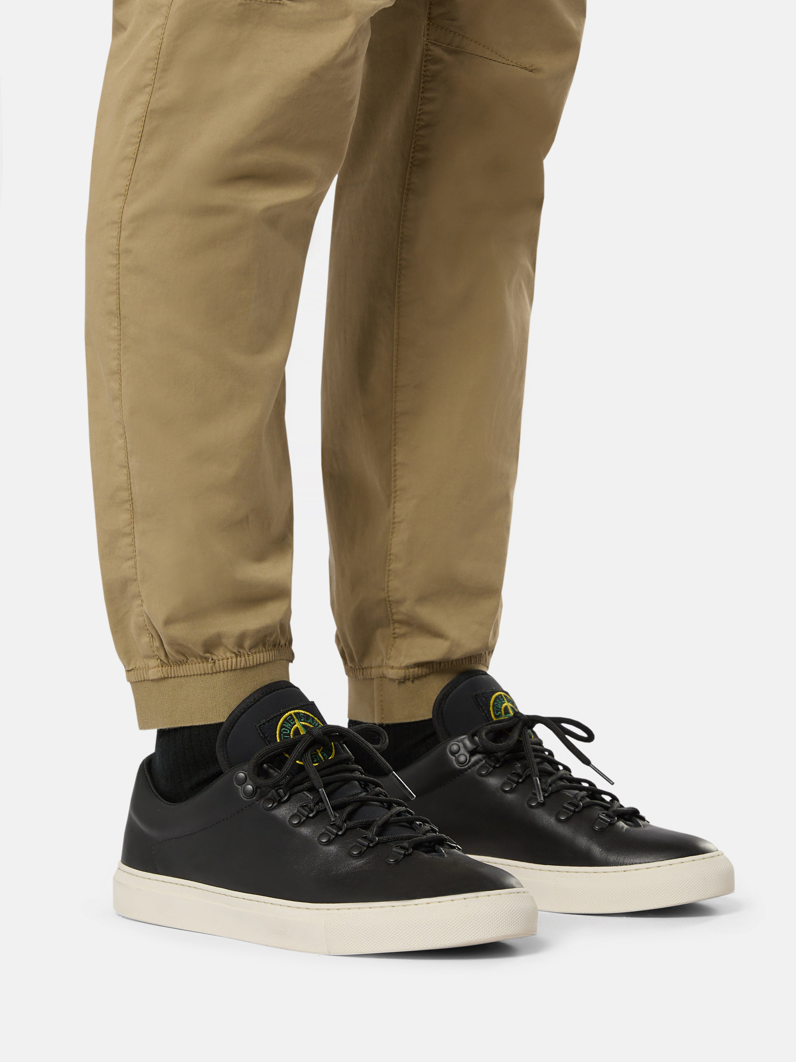 Pair — the leather upper and cream cupsole