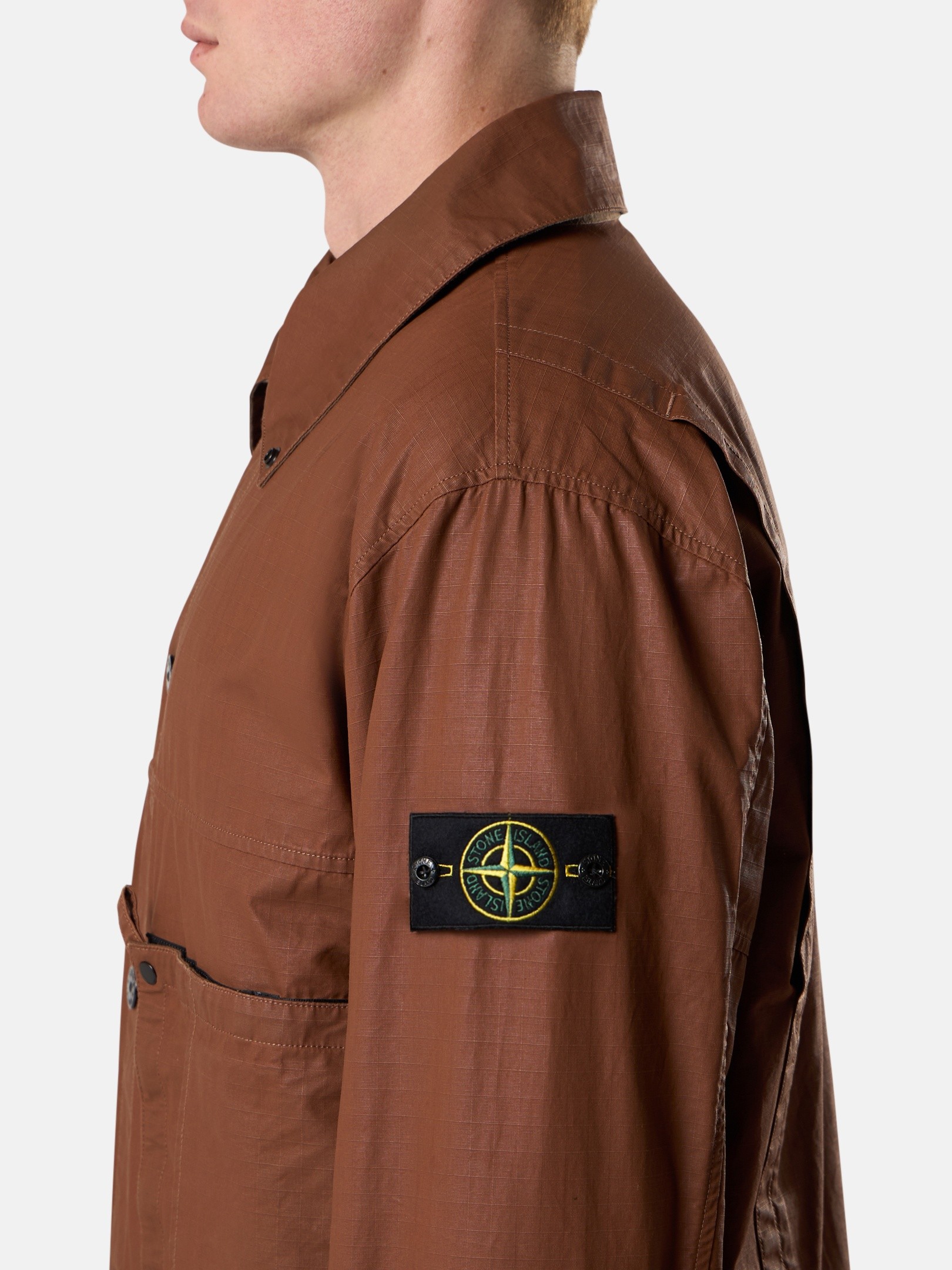 Detail — the utility pockets and snap buttons