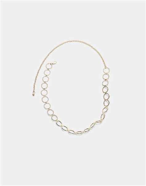 Stradivarius Metal circle belt in gold | ASOS