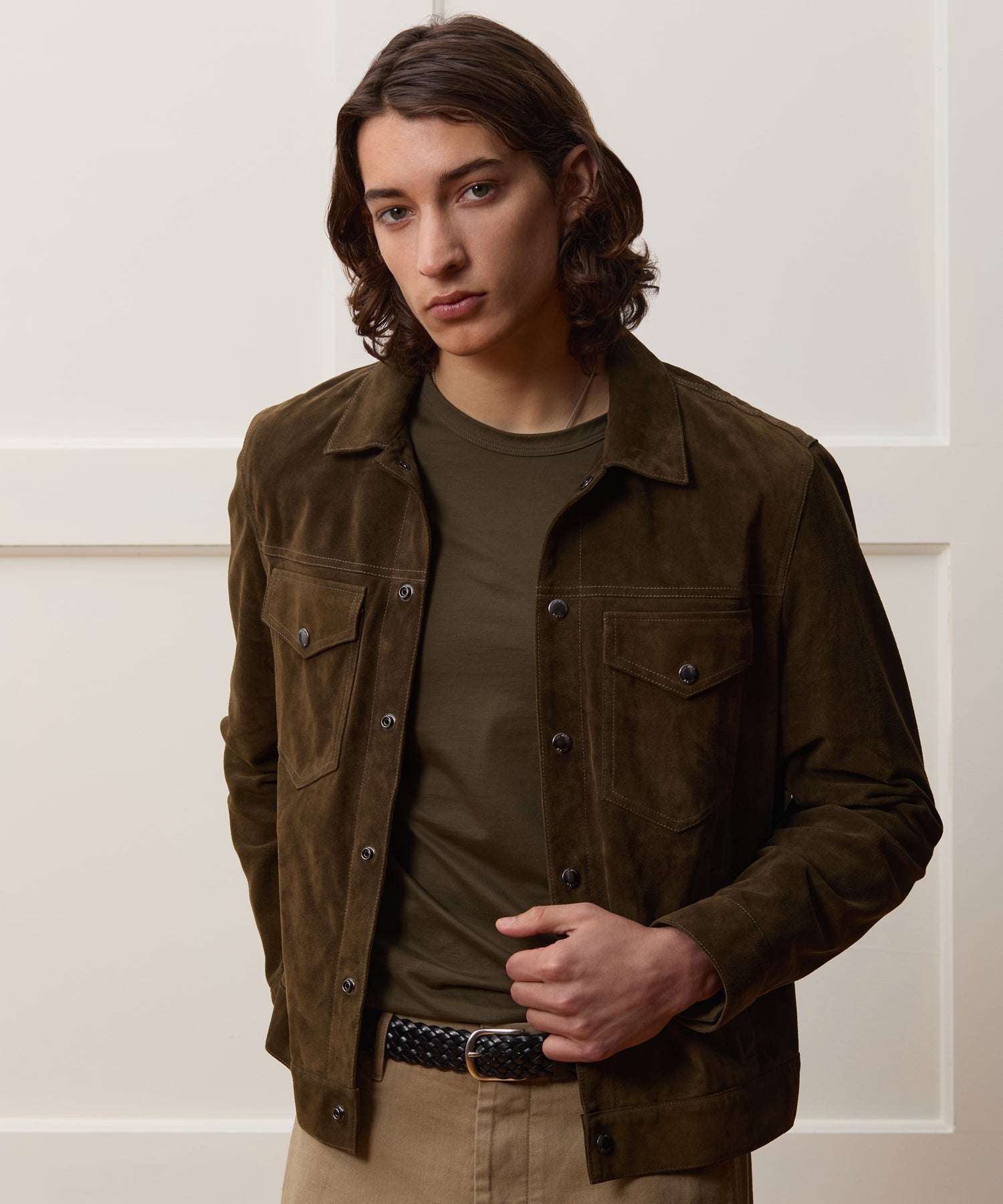 Side profile showing the hip-length trucker body