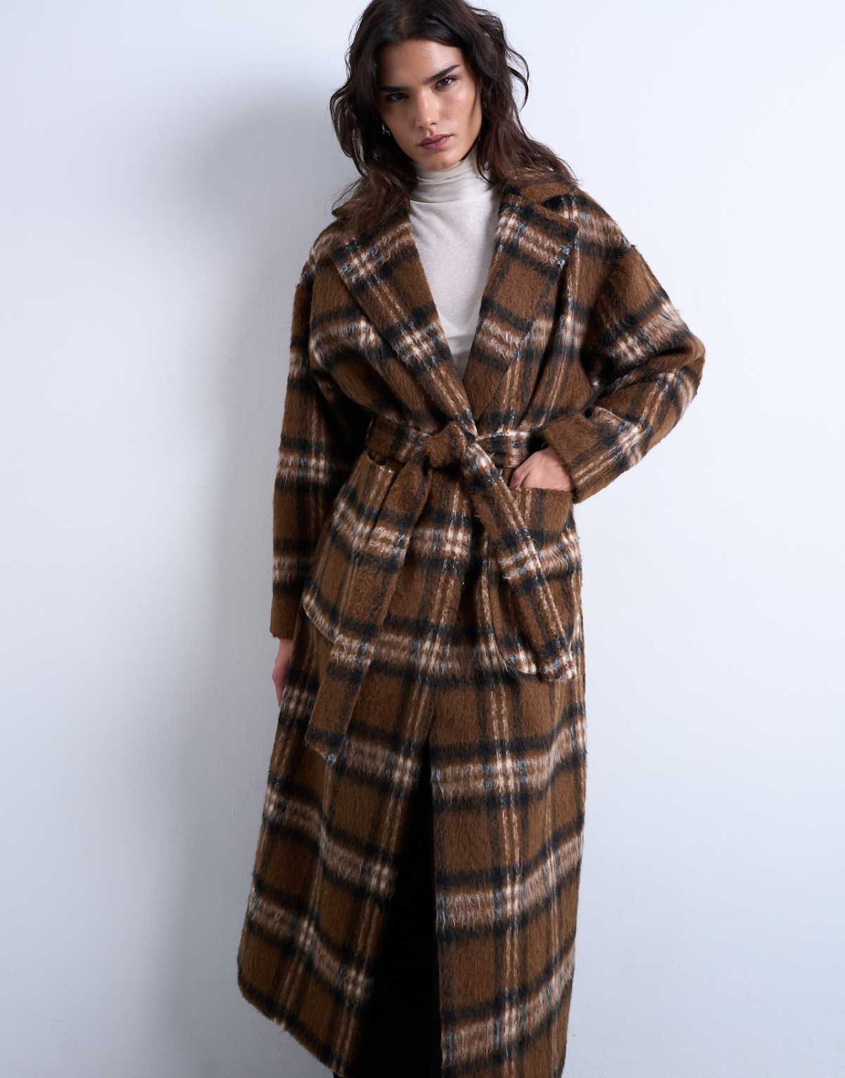 Front styling with the belted waist