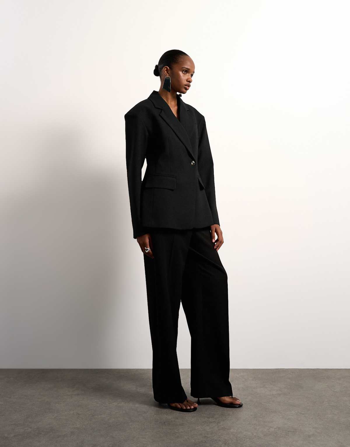 Full-length styling with matching trousers