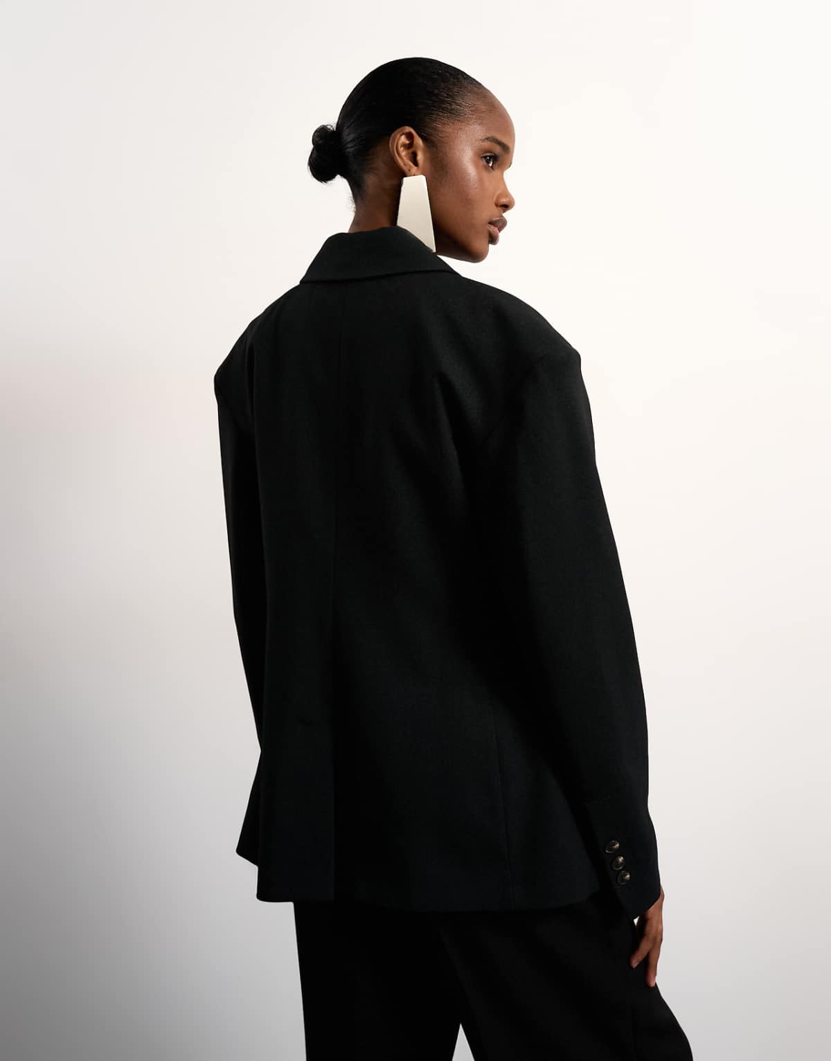 Back view showing the structured shoulder line