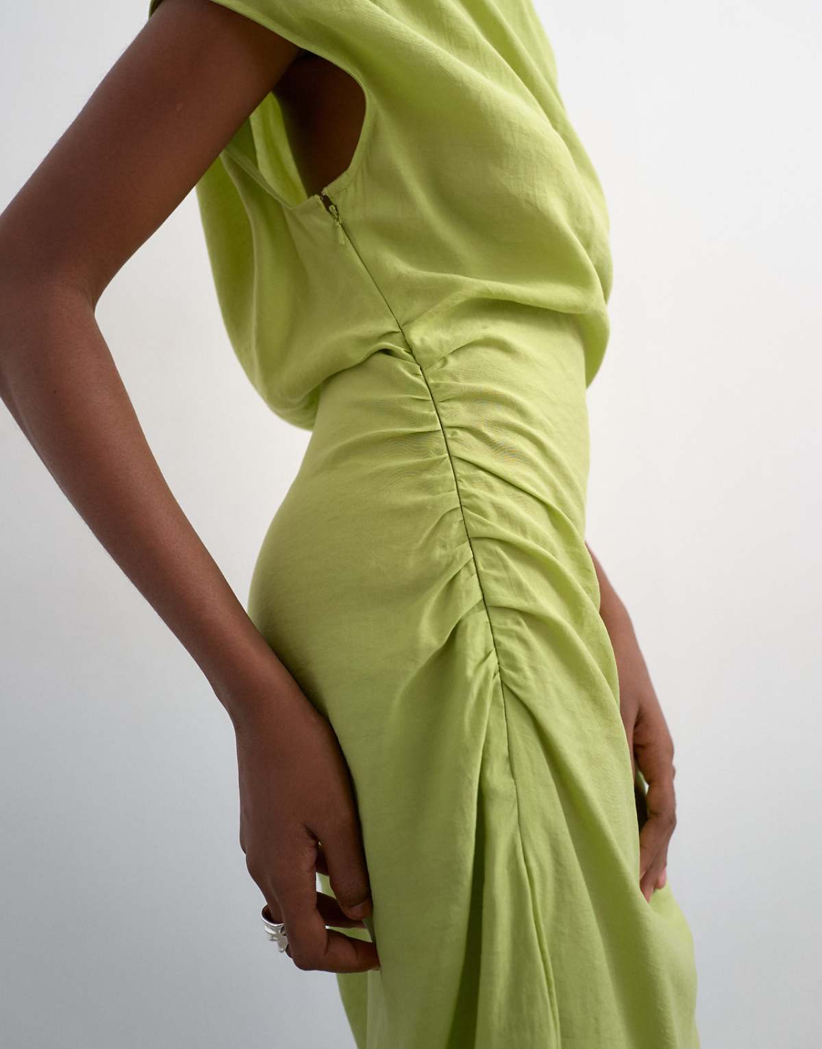 Close-up of the ruched side and split
