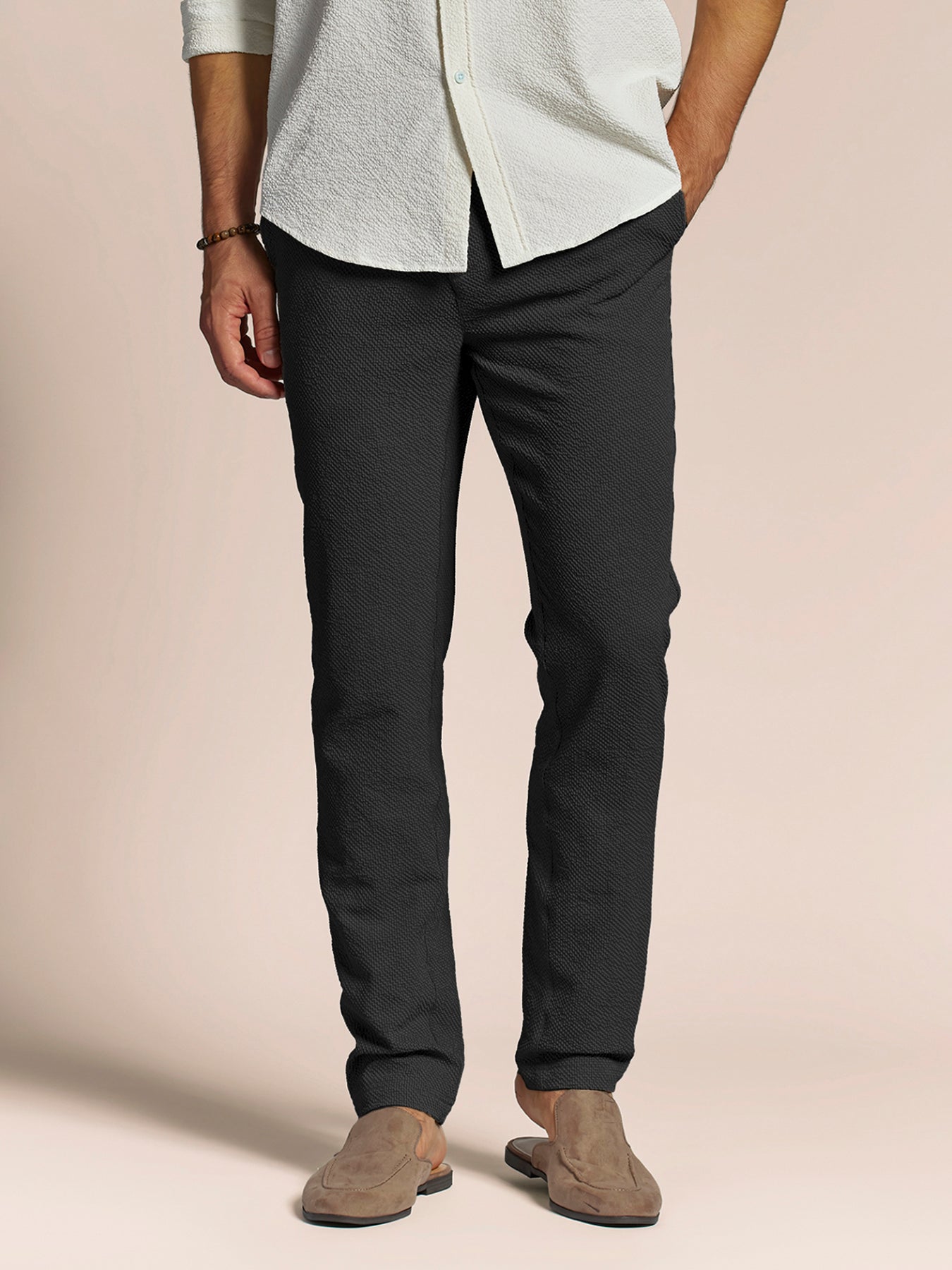 Side view of the straight travel-trouser fit